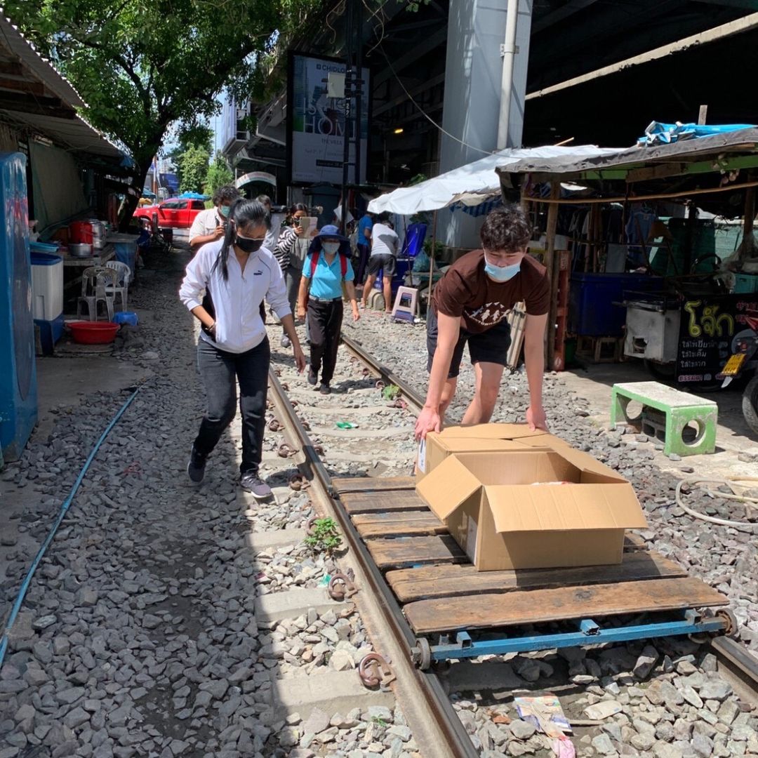 Volunteers bringing the Food Donations to the Street Children in Sukhumvit 1